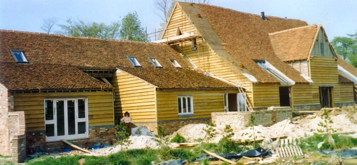 Barn frame squared up and reassembled by David French Partnership