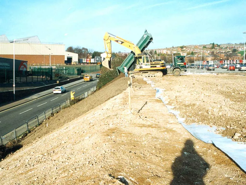 Vauxhall Car Park Extension. Cut and fill across a 30 metre level change. David French Partnership structural engineers