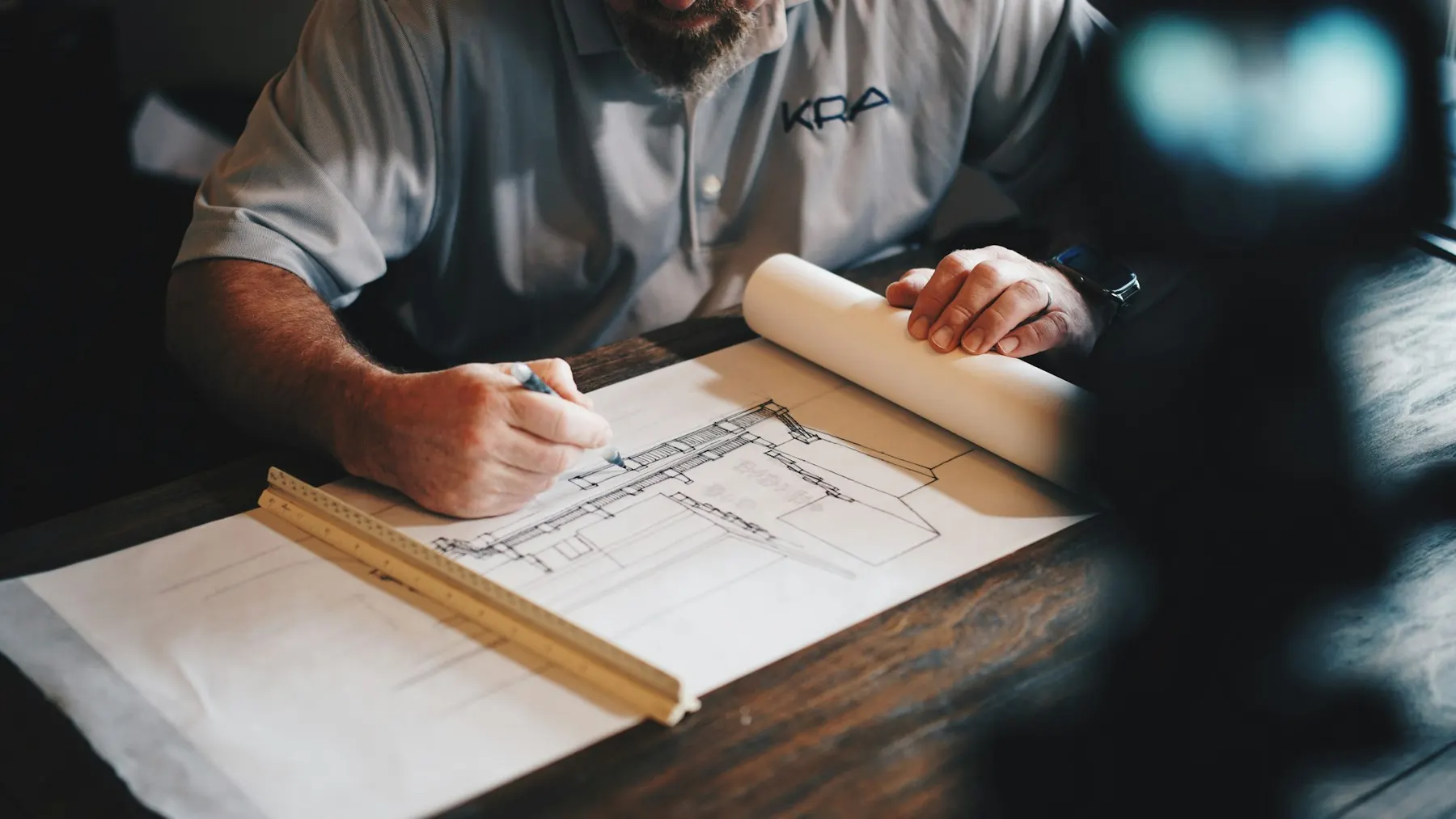 Engineer marking up a structural drawing, David French Partnership Luton